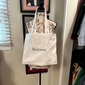 Realisation Par White Tote Bag